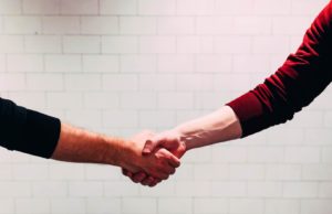 Handshake on a white background 